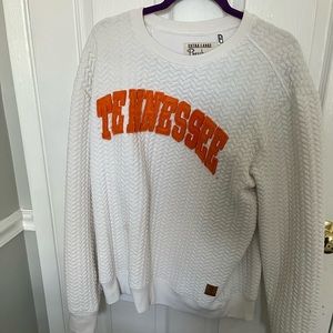 Tennessee sweatshirt.